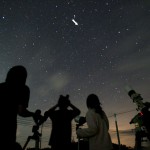 Observing Comet Lulin (me -- standing left with my 11x70; image by Xun Zheng, arrow points at Comet Lulin)